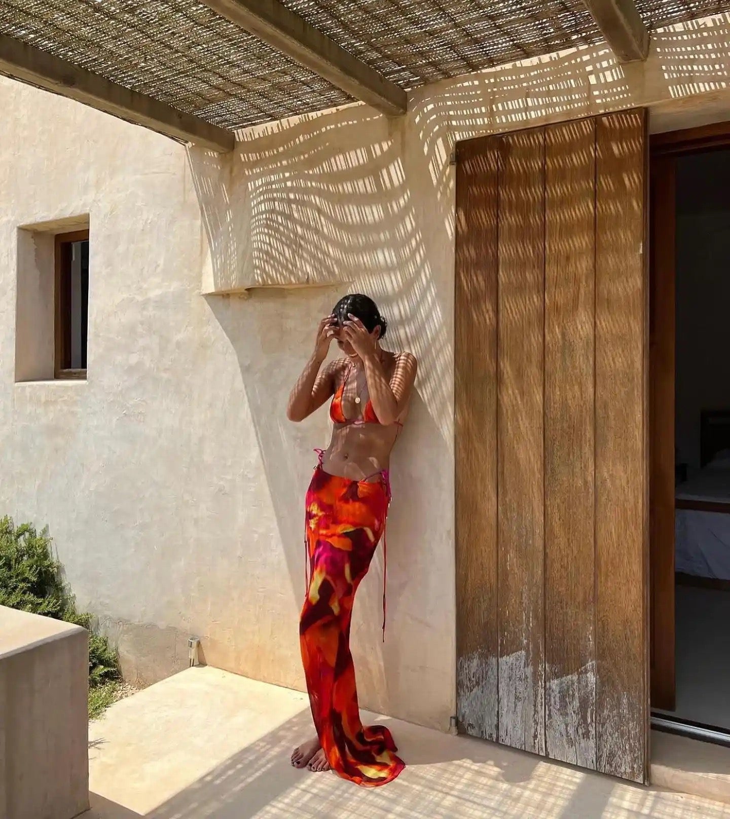 ORANGE AND RED SWIRL THREE PIECE BIKINI AND SKIRT SET