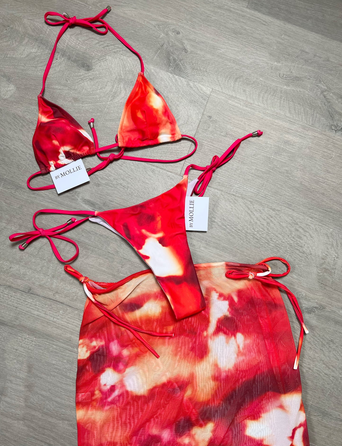 ORANGE AND RED SWIRL THREE PIECE BIKINI AND SKIRT SET