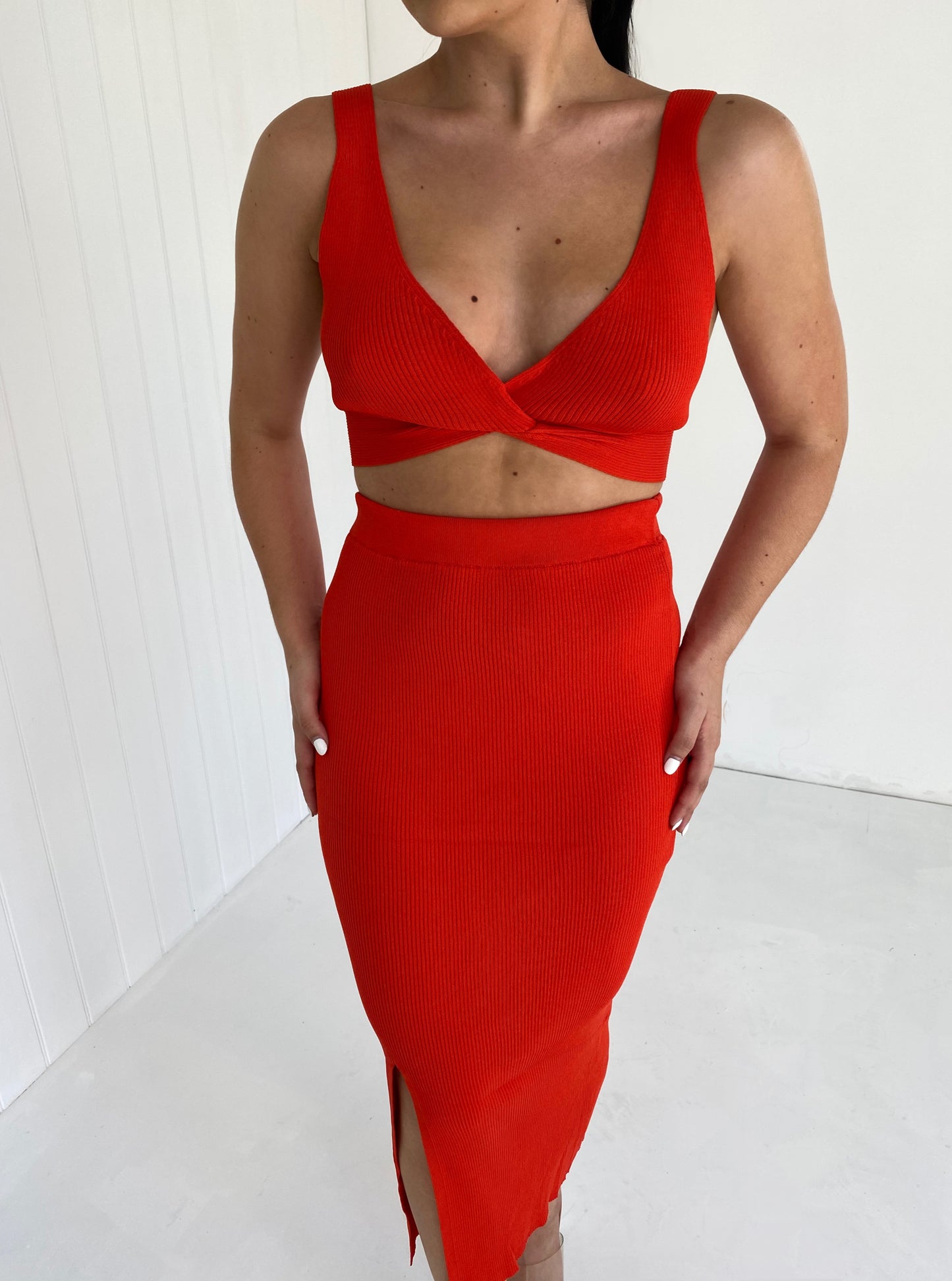 RED KNIT BRALET AND SLIT LEG MIDI SKIRT