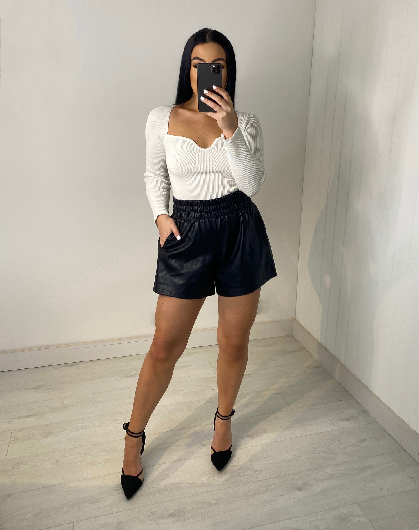 BLACK FLARE VEGAN LEATHER SHORTS