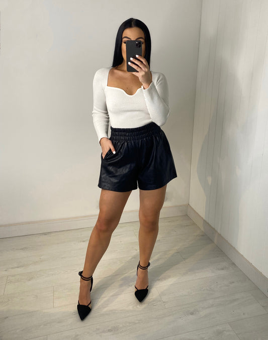 BLACK FLARE VEGAN LEATHER SHORTS