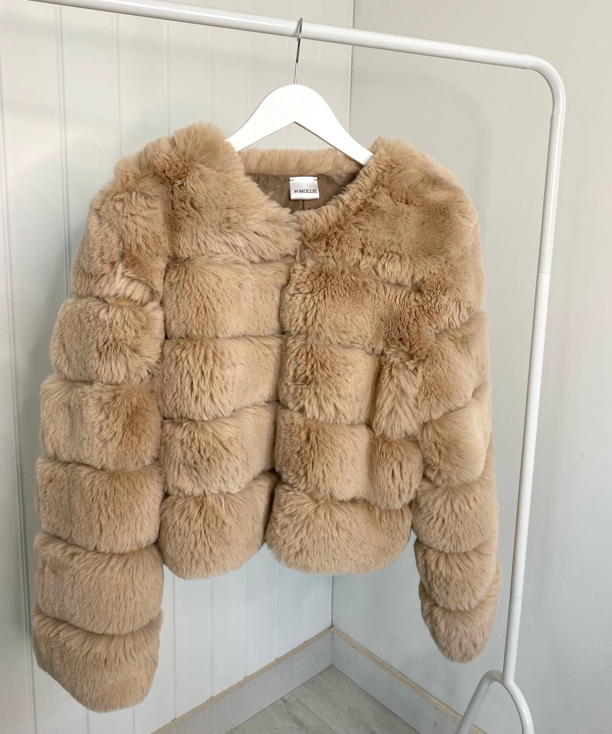 Furry beige jacket best sale