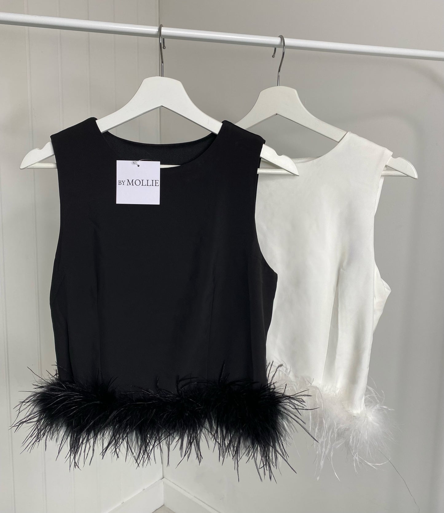 FEATHER HEM CROPPED VEST